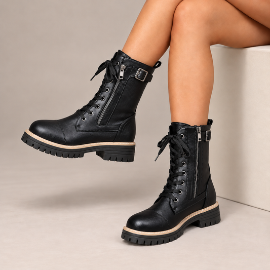 Henrietta™ | Lace-Up Side-Zip Combat Boots in Black, worn in a beige studio
