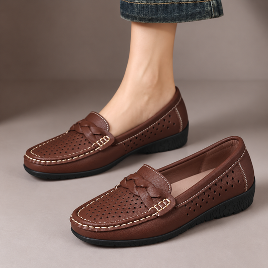 Florence™ | Perforated Comfort Loafers — one worn shoe and one matching shoe in a taupe studio
