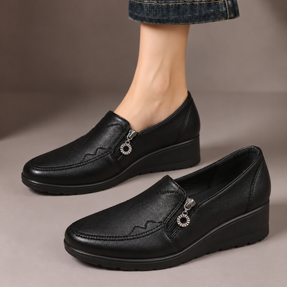 Harriet™ | Side-Zip Wedge Loafers — one worn shoe and one matching shoe in a taupe studio