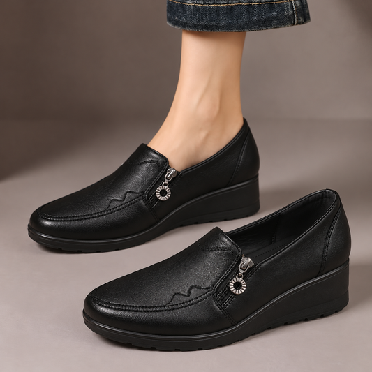 Harriet™ | Side-Zip Wedge Loafers — one worn shoe and one matching shoe in a taupe studio