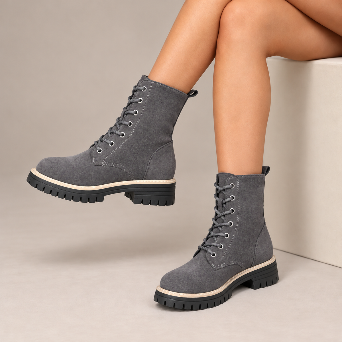 Juniper™ | Suede-Look Lace-Up Platform Boots in Grey, worn in a beige studio