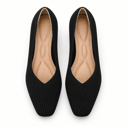 Mariella black ribbed-knit court shoes, overhead view showing the pair and tan insoles