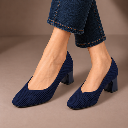 Mariella blue ribbed knit court shoes with square heels, worn with dark jeans in a taupe studio