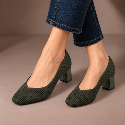 Mariella green ribbed knit court shoes with square heels, worn with dark jeans in a taupe studio