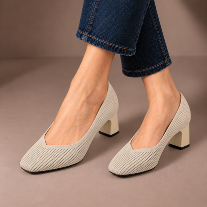 Mariella light apricot ribbed knit court shoes with square heels, worn with dark jeans in a taupe studio