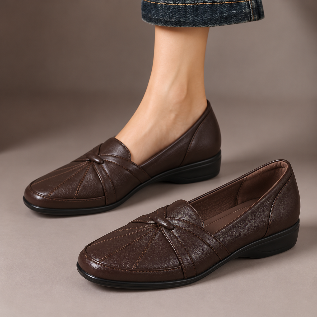 Prudence™ | Knot Detail Comfort Loafers — one worn shoe and one matching shoe in a taupe studio