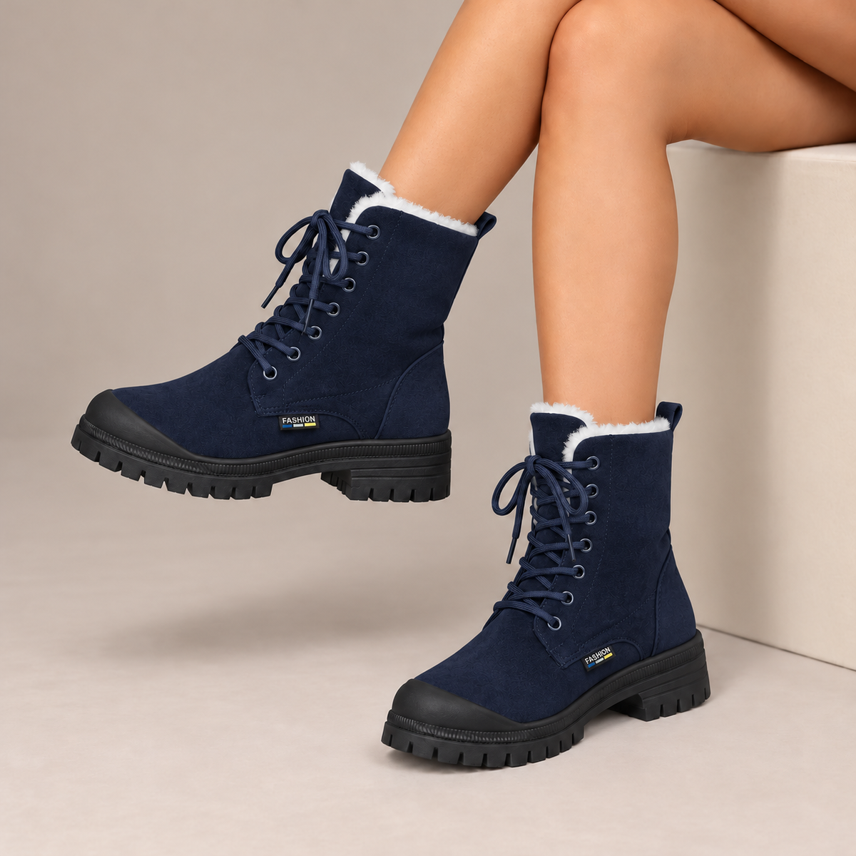 Rosalind™ | Plush-Lined Lace-Up Snow Boots in Navy, worn in a beige studio