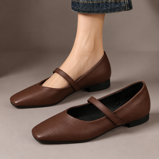 Rosamund™ | Square-Toe Mary Jane Flats — one worn shoe and one matching shoe in a taupe studio